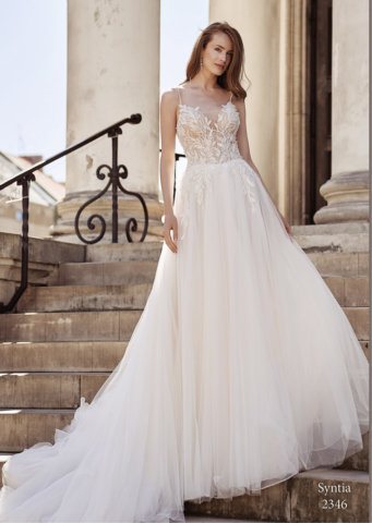Abito con corpino ricamato e gonna glietter in tulle