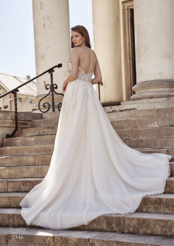 Abito con corpino ricamato e gonna glietter in tulle