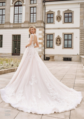Abito in pizzo con sopragonna di tulle e pizzo